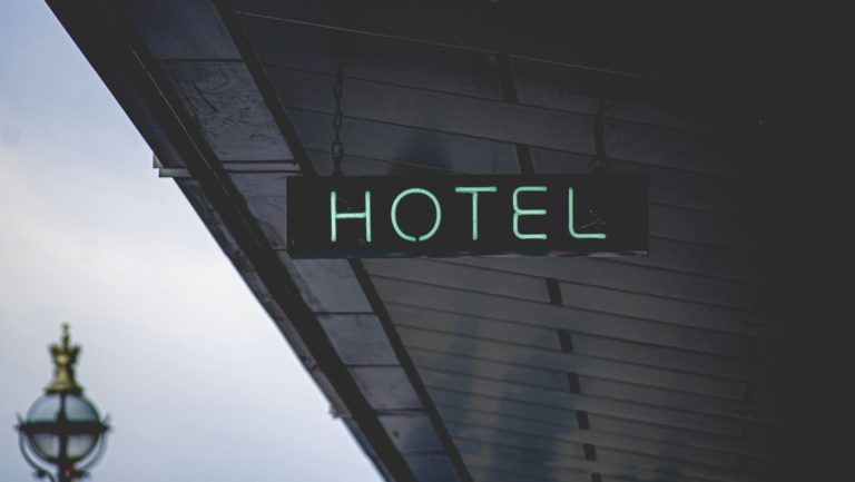 a street sign on a bridge